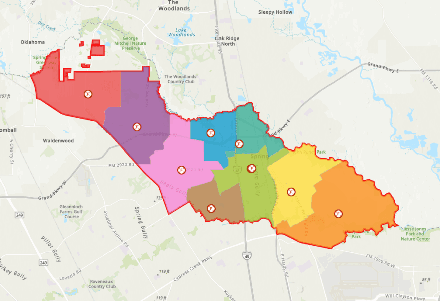 A color-coded map of Spring, Texas, shows district boundaries with icons marking specific locations or facilities within each district. Major roads and parks are labeled.
